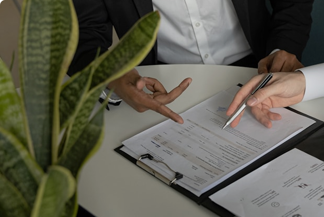 Business team reviewing payroll documents